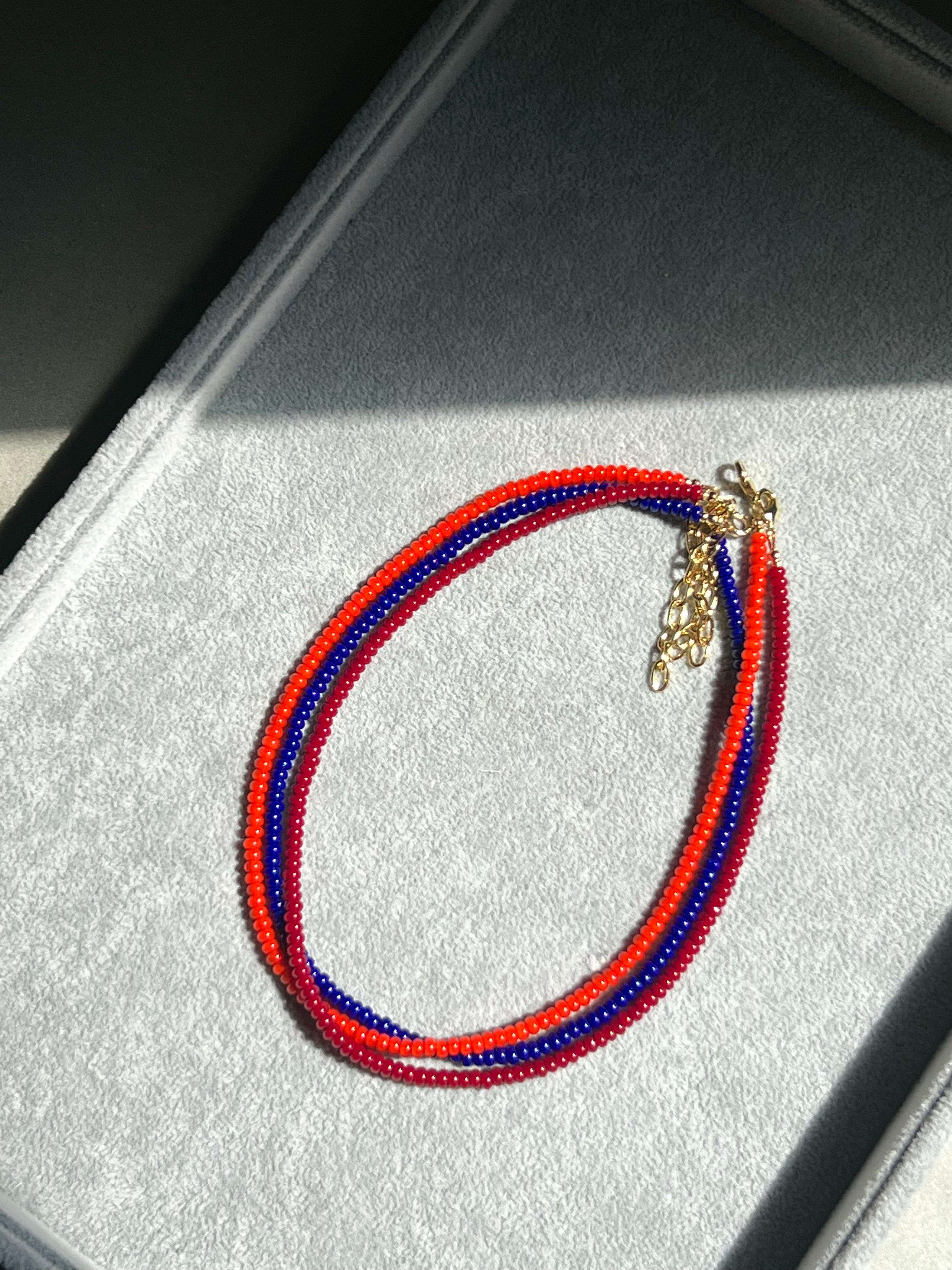 ORANGE LAYERING NECKLACE
