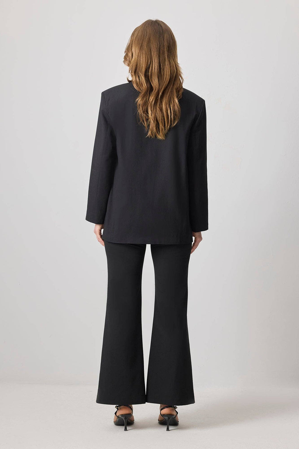 Polished Blazer with Gold Statement Button:  Black
